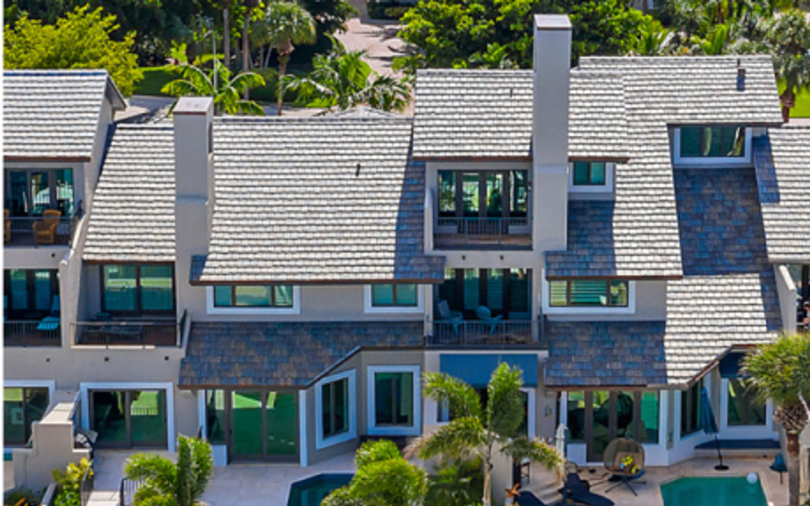 Completed shingle re-roof on a South Florida HOA residence